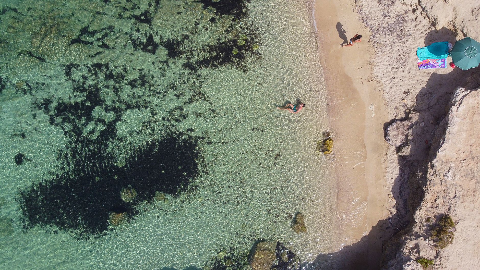 Stunning aerial view of Gallipoli's clear waters and sandy shores