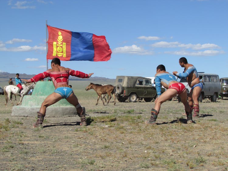 Men On Traditional Show With Horses