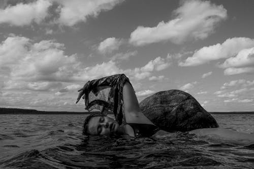 Free Woman in Bikini in Body of Water Stock Photo