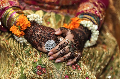 Free Woman with Henna Tattoo on Hands Wearing Rings Stock Photo