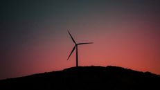 Wind Turbine on Hill during Dusk