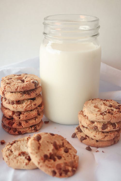 Free Chocolate Chip Cookies and a Glass of Milk  Stock Photo