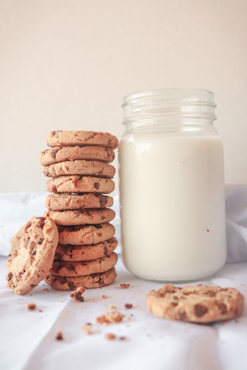 Free Chocolate Chip Cookies and a Glass of Milk  Stock Photo