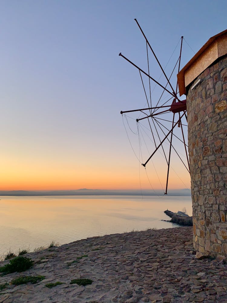 A Windmill Fronting The Sea