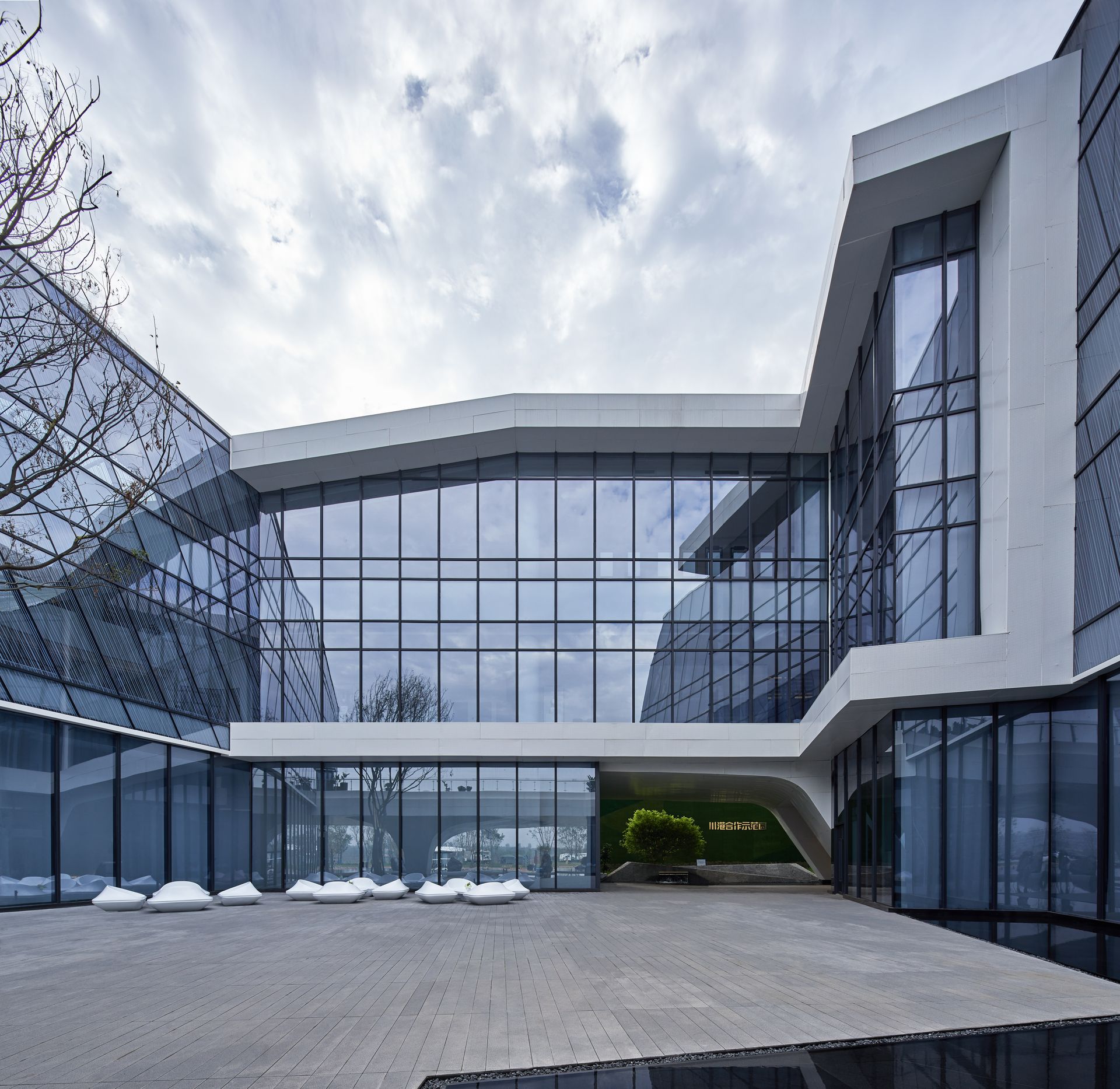 Contemporary building with glass facade in Sichuan, China showcasing modern architectural design.