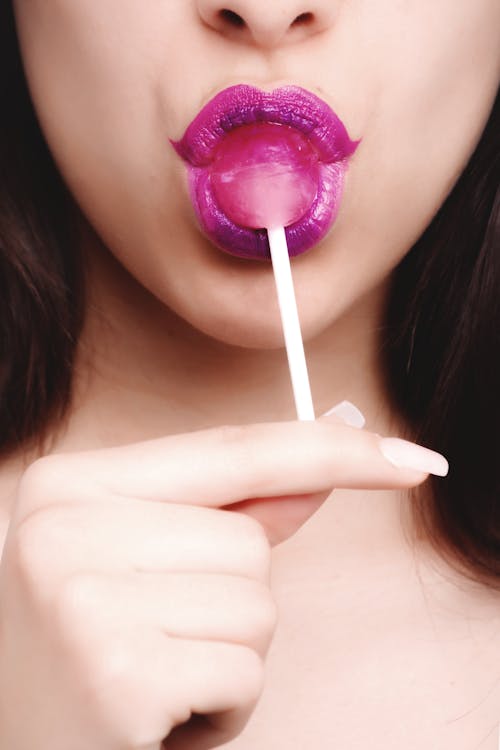 Woman With Pink Lollipop