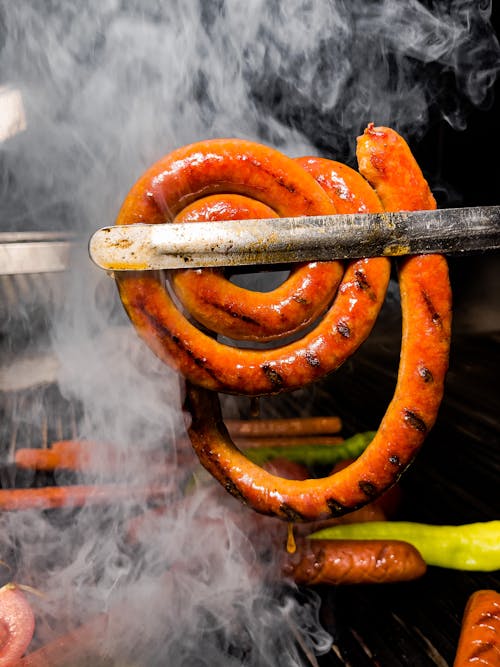 Close Up Photo of Grilling of Sausage