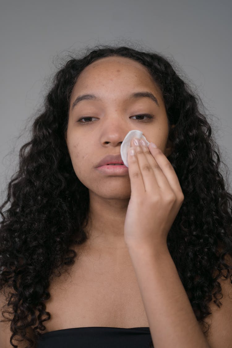 Woman Cleaning Her Face