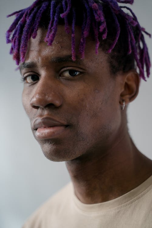 Man with Purple Hair Wearing Hoop Earring