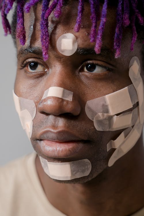 Free Close Up Photo of Man with Bandages on his Face Stock Photo