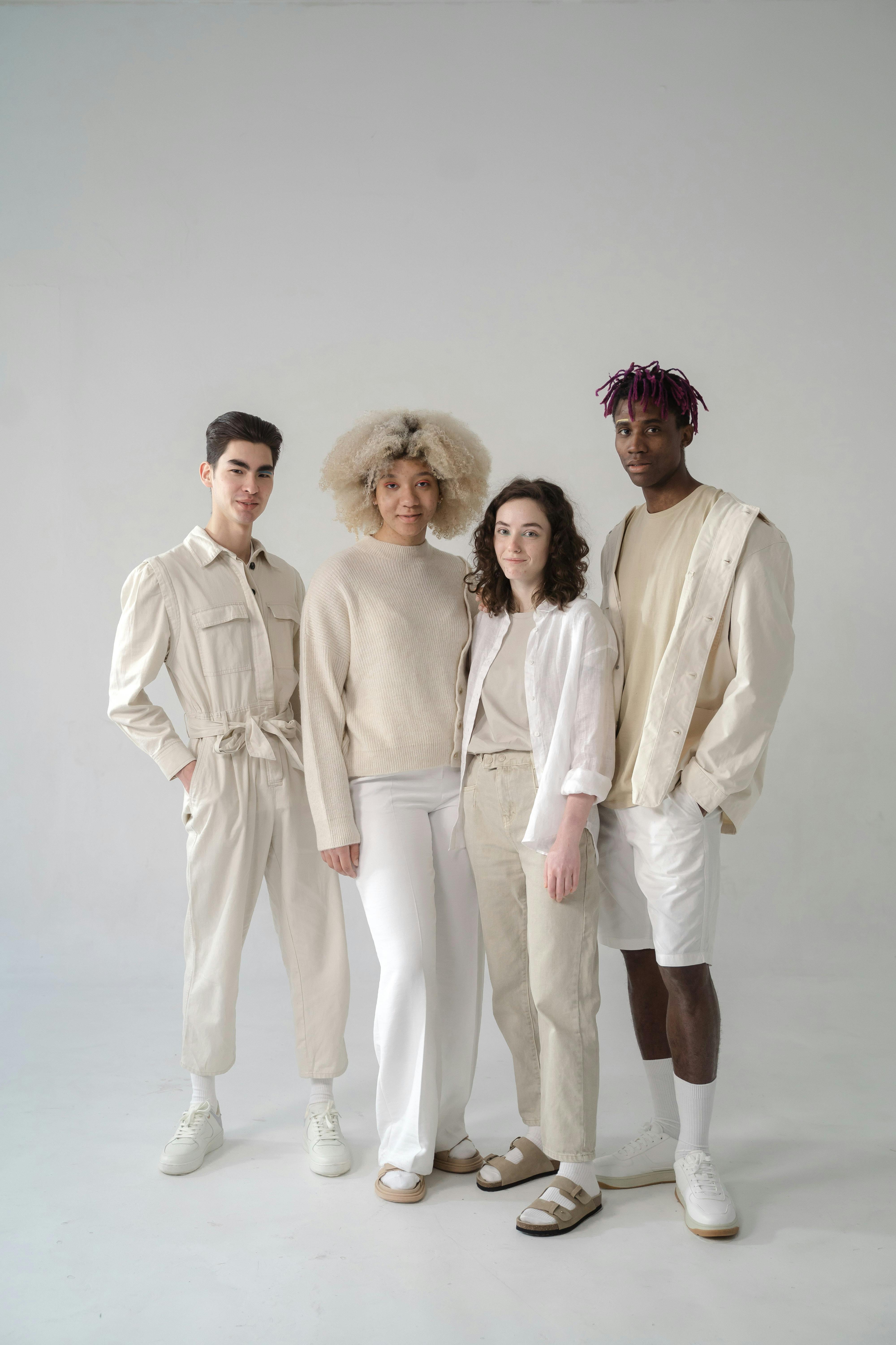 Group of People in Beige and White Outfits · Free Stock Photo