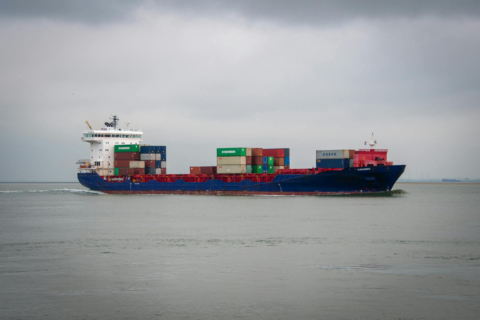 A cargo ship carrying containers on the ocean near Terneuzen, Netherlands.