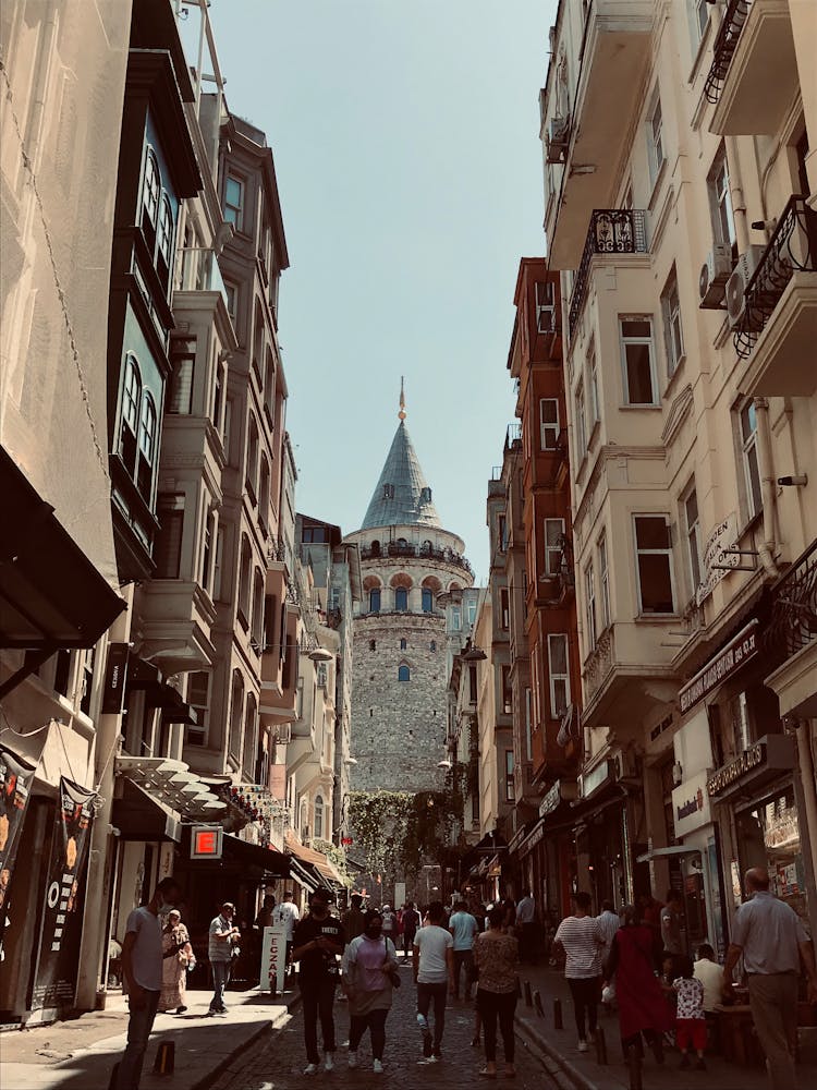 People Walking Old City Street