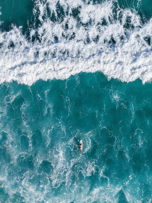 Aerial View of a Person Surfing