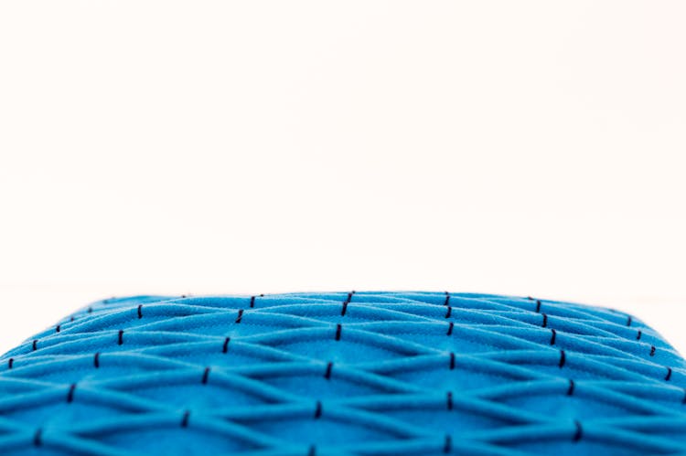 Angled Shot Of A Blue Textured Pillow