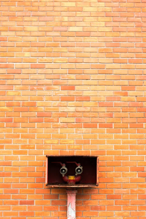 Free Brown Concrete Brick Wall Stock Photo