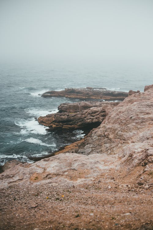 Foto profissional grátis de áspero, costa, mar