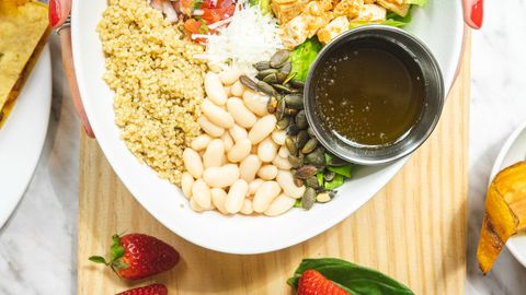 Delicious and colorful salad bowl featuring fresh ingredients like quinoa and avocado, perfect for a healthy meal.