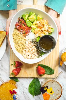 Delicious and colorful salad bowl featuring fresh ingredients like quinoa and avocado, perfect for a healthy meal.