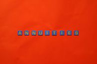 Close-Up Shot of Text on a Red Surface
