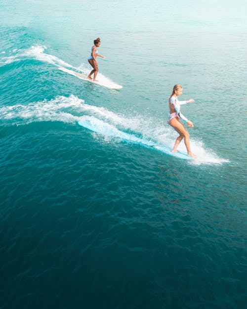 Two Women Surfing