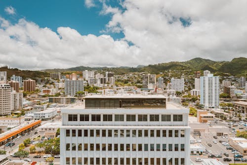 White Concrete Building Under Blue Sky