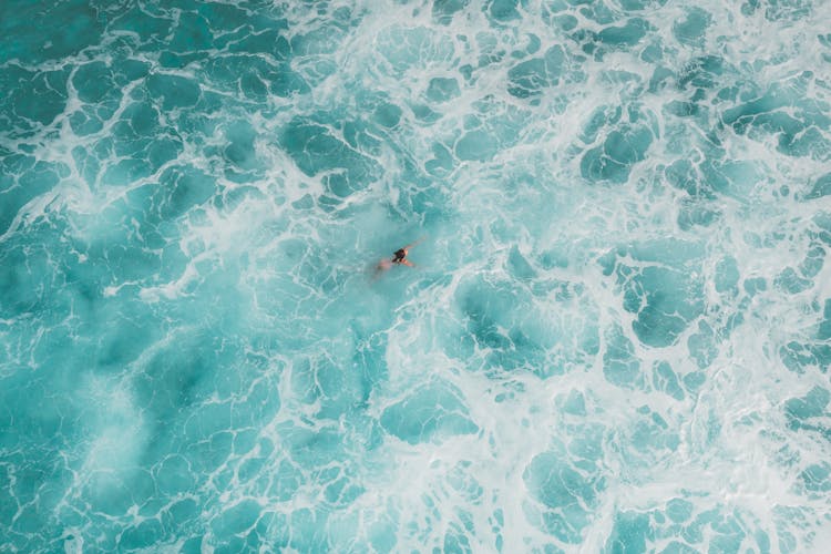 Woman Swimming In The Sea