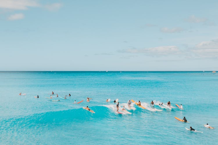 Surfers On Wave