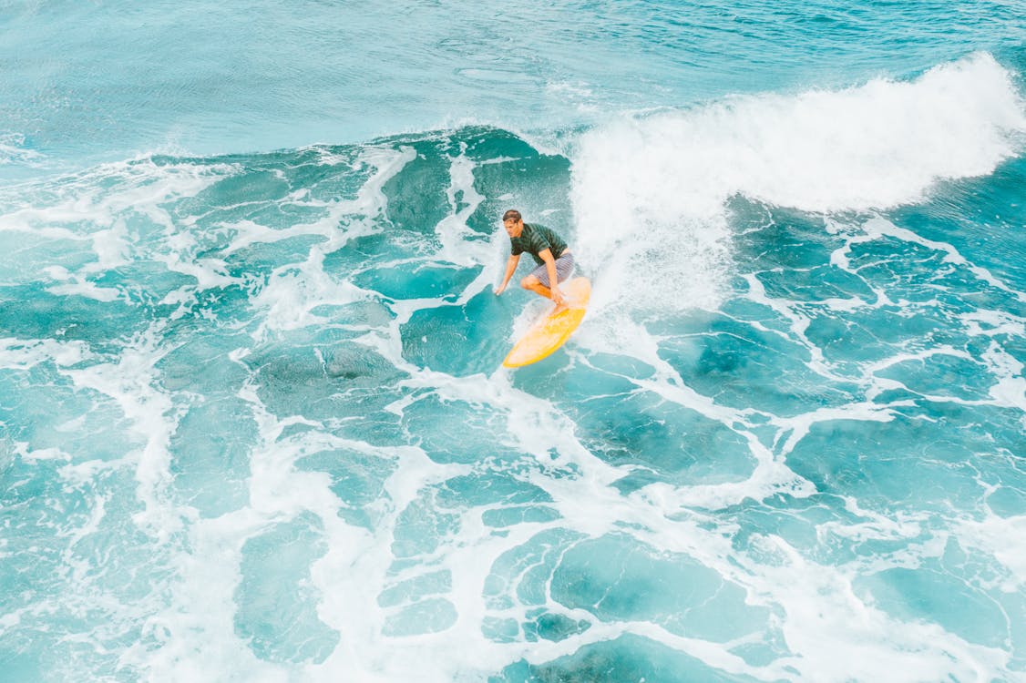 Man Surfing on the Sea