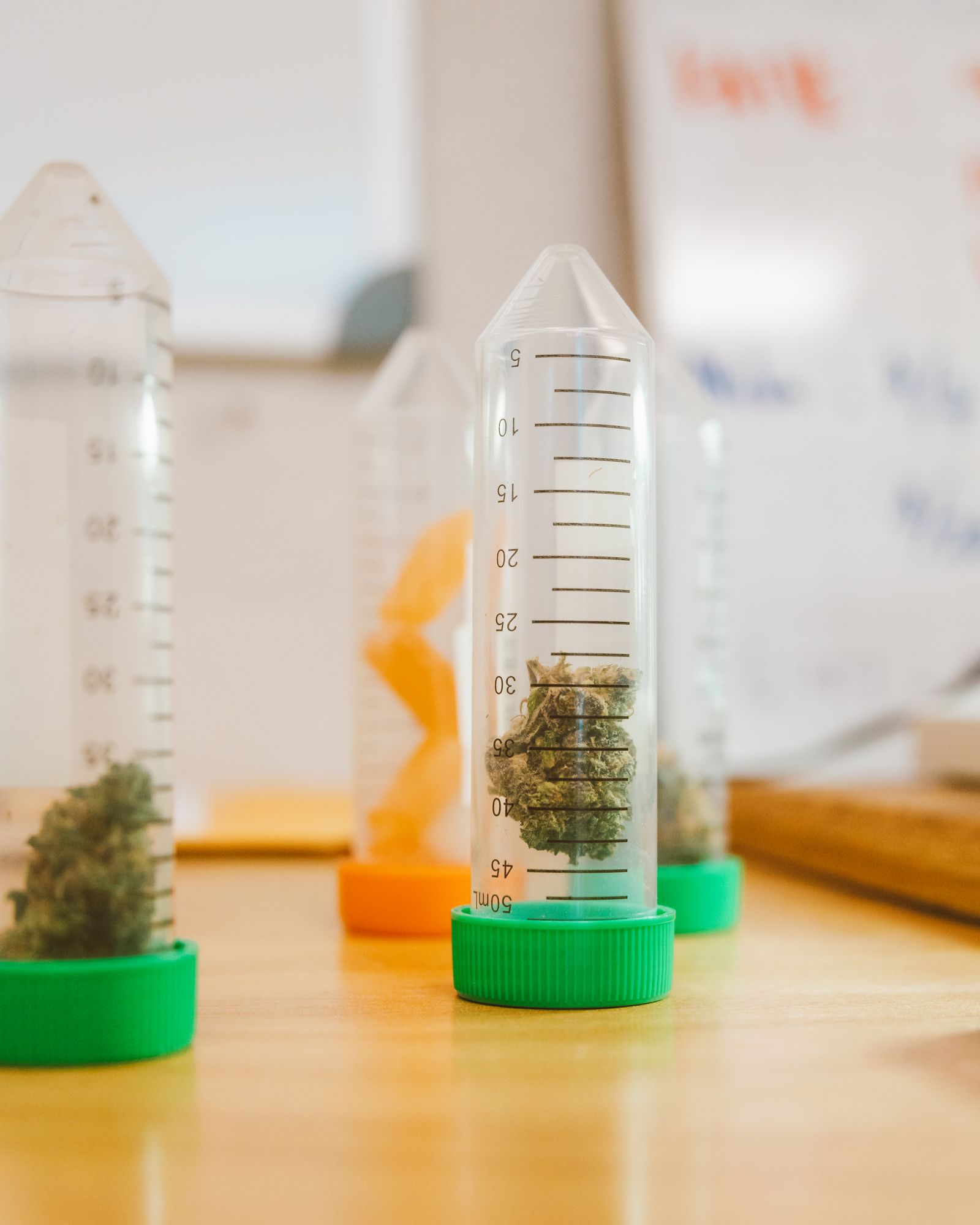 Hash rosin extract in labeled containers ready for packaging