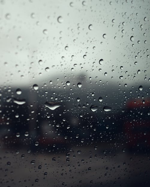 Free Water Droplets on a Glass Window Stock Photo