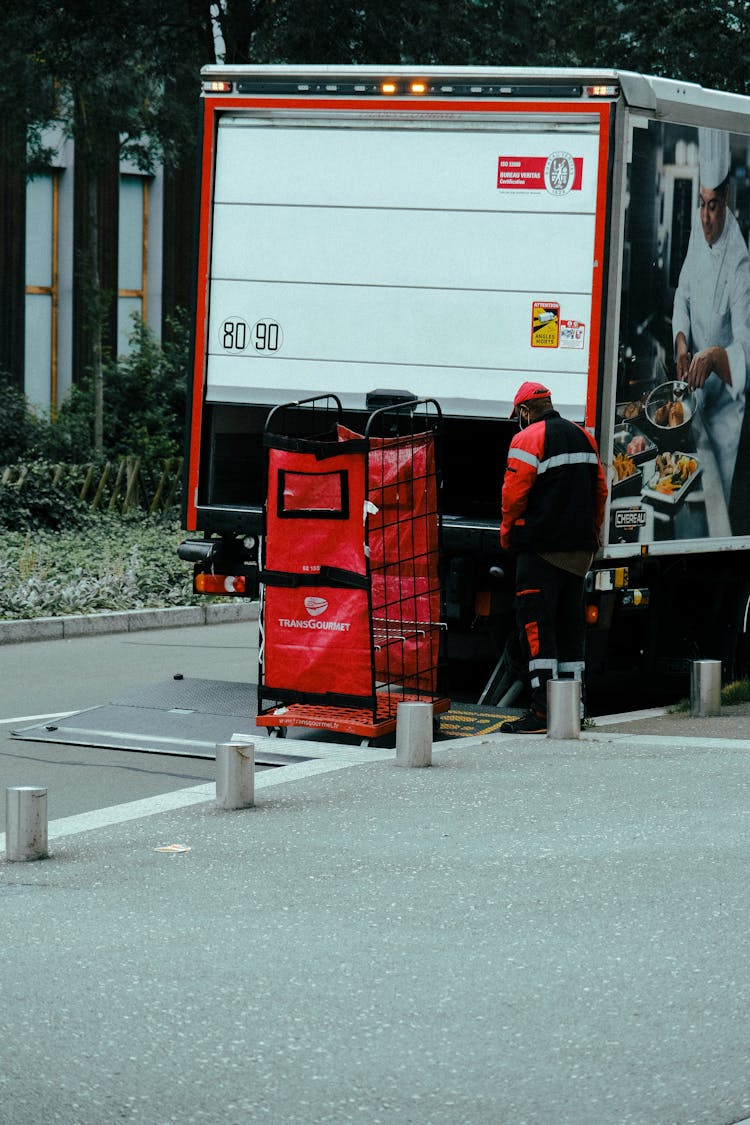 Delivery Driver Unloading Truck