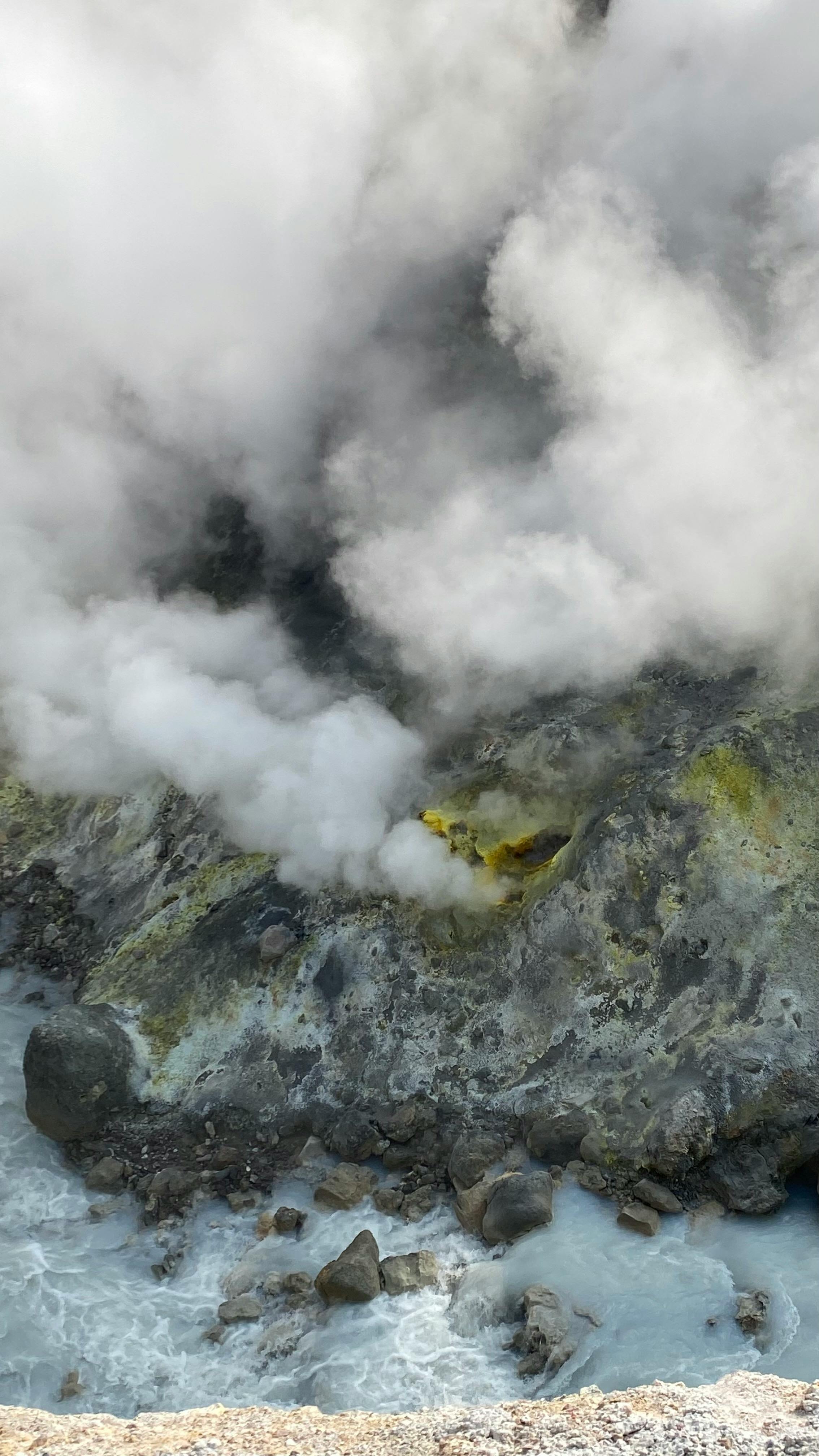 majestic sulfur formation with gray vapor