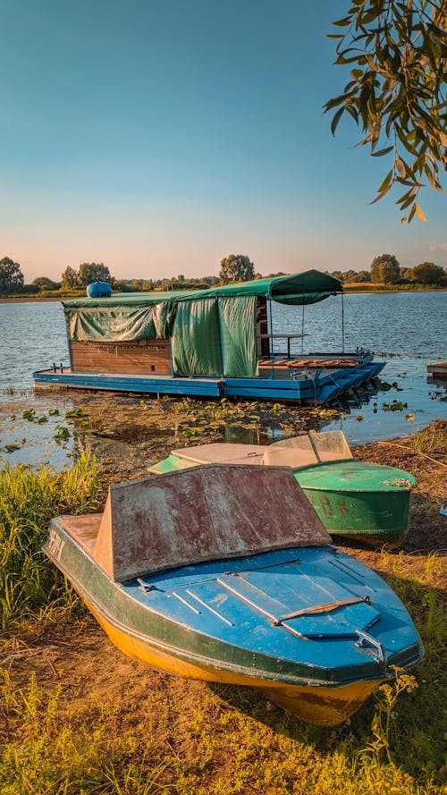 Wooden Boats on the Lake Shore