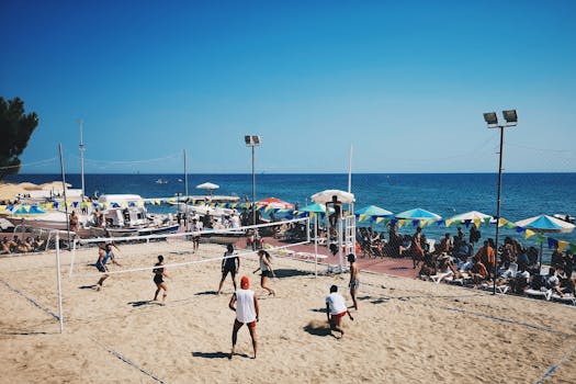 Energetic beach volleyball match in Silivri, Turkey, with vibrant summer vibes and a lively crowd.