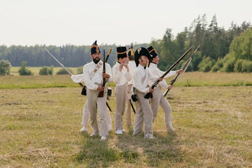 Men in Costumes during Historical Reenactment