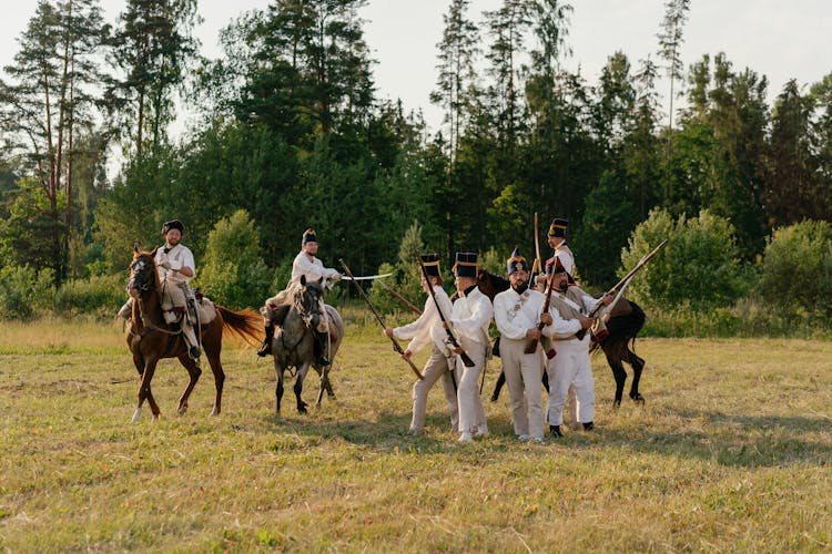 Soldiers Fighting On A Grass Field