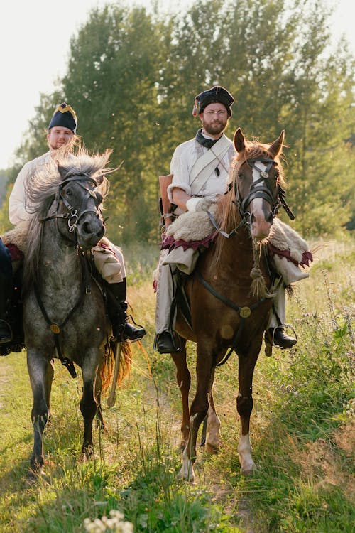 Men Wearing Military Uniform Riding Horses