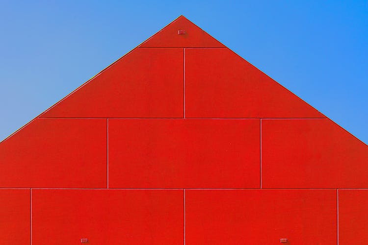 A Building Made Of Red Blocks