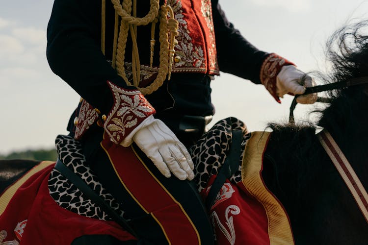 A Horseman Riding On Black Horse