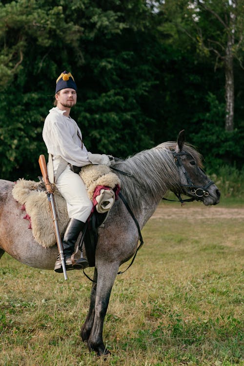 A Man Riding on a Horse