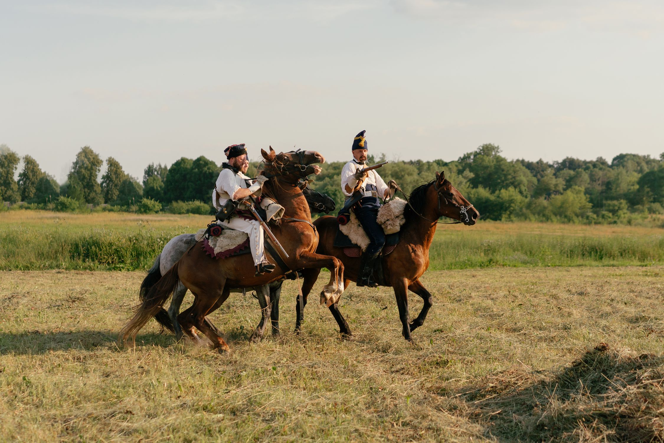 Soldiers in Historical Military Uniforms Riding Horses · Free Stock Photo