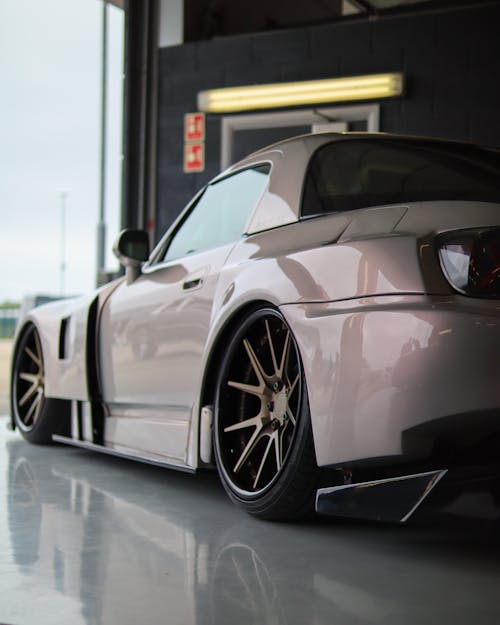 A White Coupe Sports Car inside the Garage