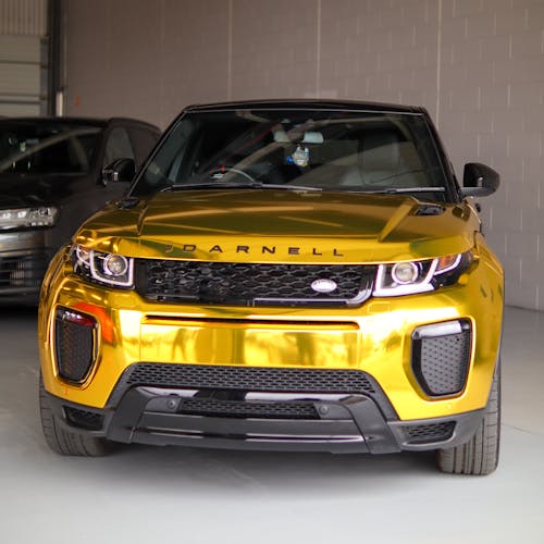 Free A Gold SUV Car inside the Garage Stock Photo