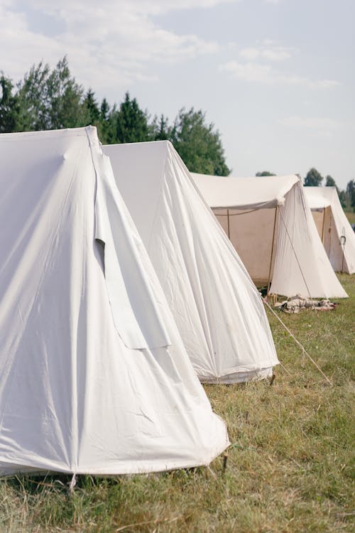 Free White Tents on Grass Field Stock Photo