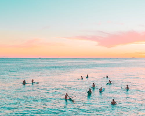 Free People Swimming on Sea Stock Photo