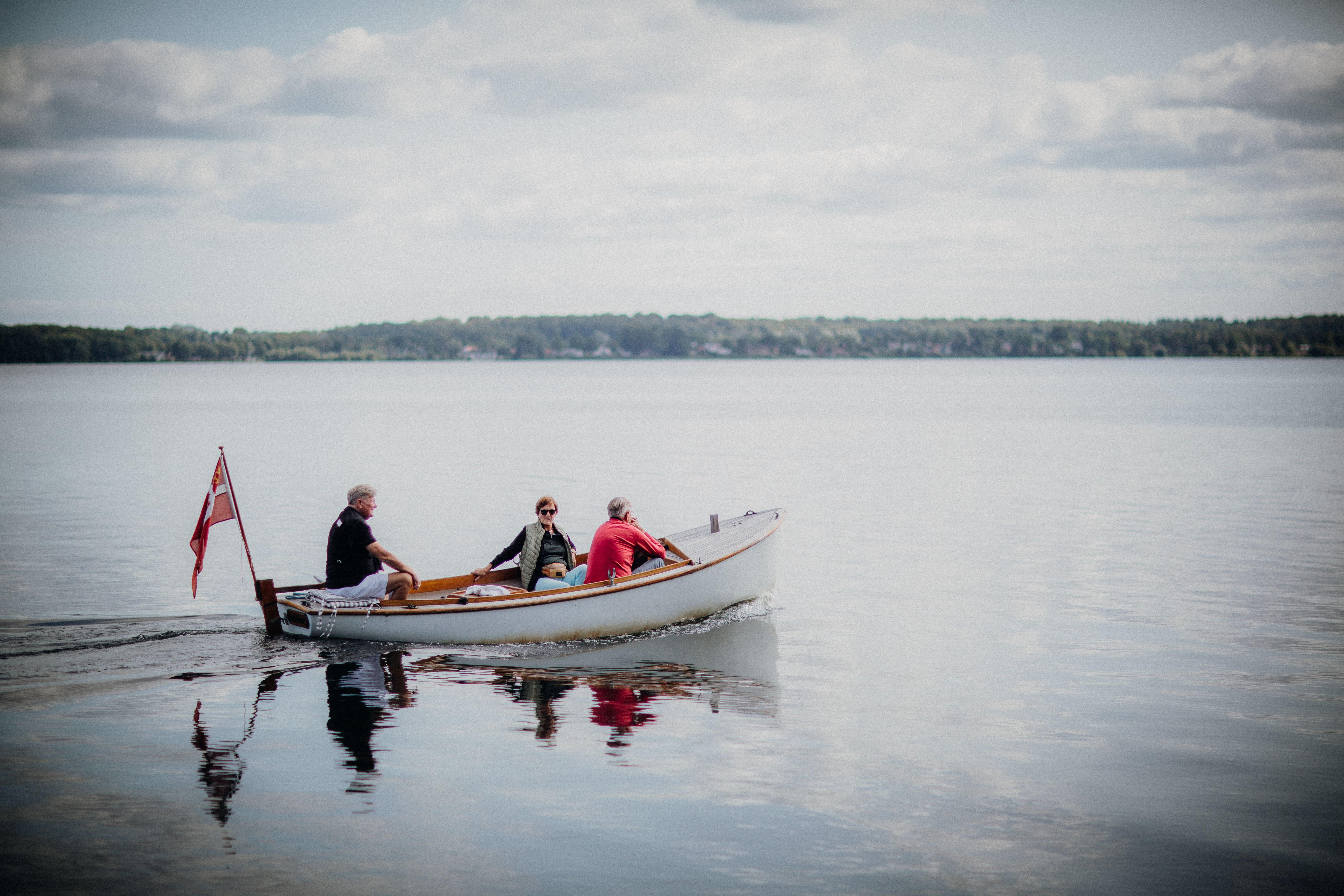 Aerial Photography of People Riding a Boat on the River · Free Stock Photo