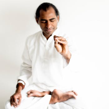 A focused yogi practices meditation and mindfulness, embodying peace and spiritual connection.