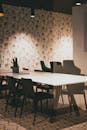 A White Table with Black Chairs