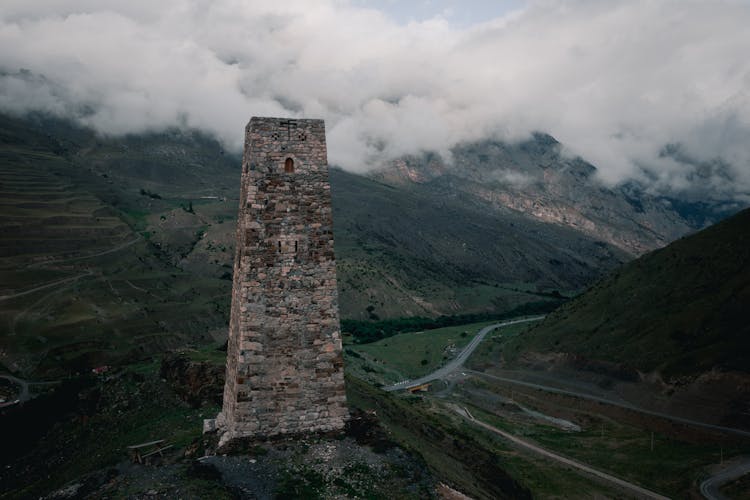 An Old Tower In Mountains